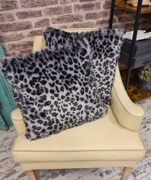 Grey spotted animal print faux fur cushions
