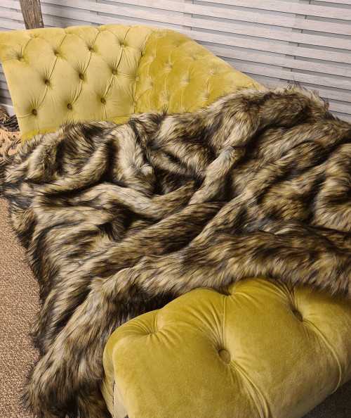 Long haired tri-coloured brown faux fur sofa throw