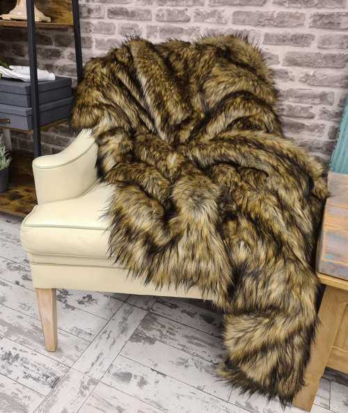 Long haired tri-coloured brown faux fur bedspread