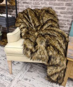 Long haired tri-coloured brown faux fur bedspread