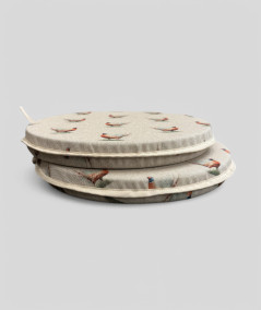 Extra thick linen style round seat pads in a small pheasant design on a beige base