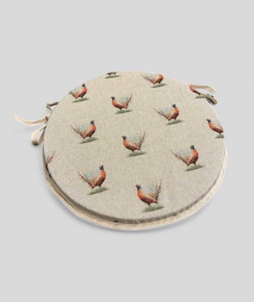 Linen style round seat pads in a bird design