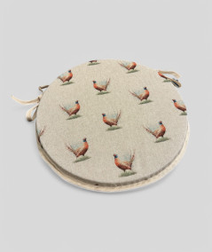 Linen style round seat pads in a bird design