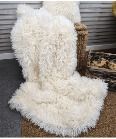 Luxury long, curly haired cream faux fur throw