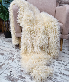 Luxury long, curly haired cream faux fur blanket