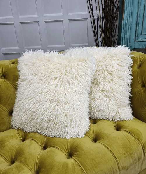 Square curly haired cream cushion covers