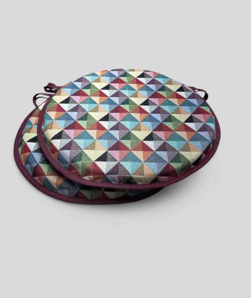Extra thick non-slip multicoloured round shaped bistro seat pads in a modern geometric diamond pattern