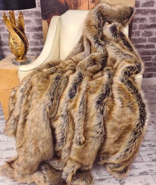 Luxury long-haired brown and beige faux fur bedspread