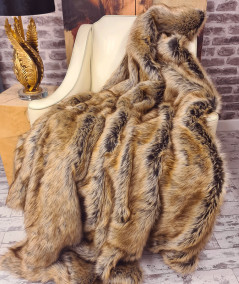 Luxury long-haired brown and beige faux fur bedspread