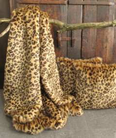 Luxury leopard print bedspread in gold and brown toned faux fur