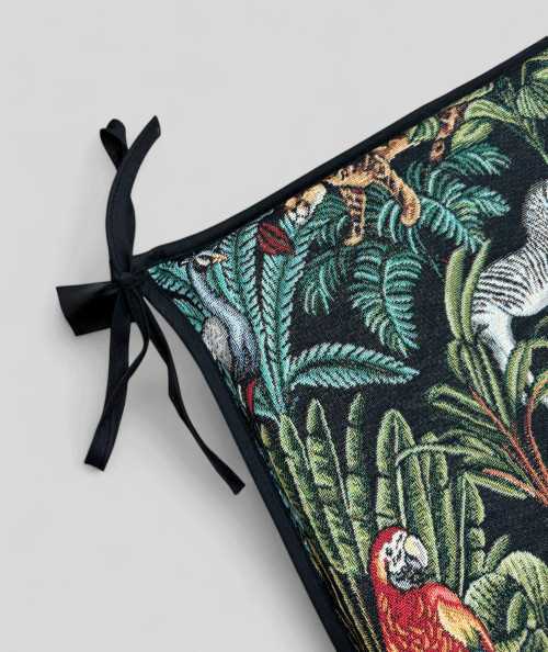 Multi-coloured tapered seat pads in a modern rainforest design on a black base