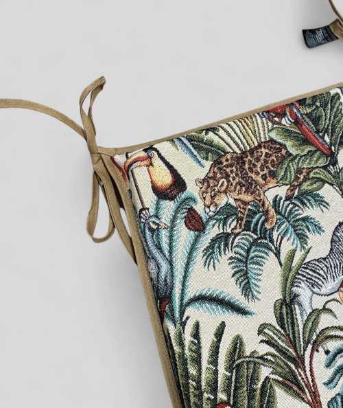 Multi-coloured tapered seat pads in a modern jungle design on a beige tapestry fabric base