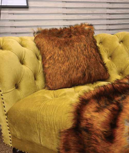 Gingery brown faux fur scatter cushions