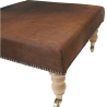 Plain dark brown cowhide footstool | Echter brauner Kuhfell-Hocker