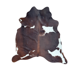 Tapis en peau de vache marron et blanche | Grandes peaux de vache